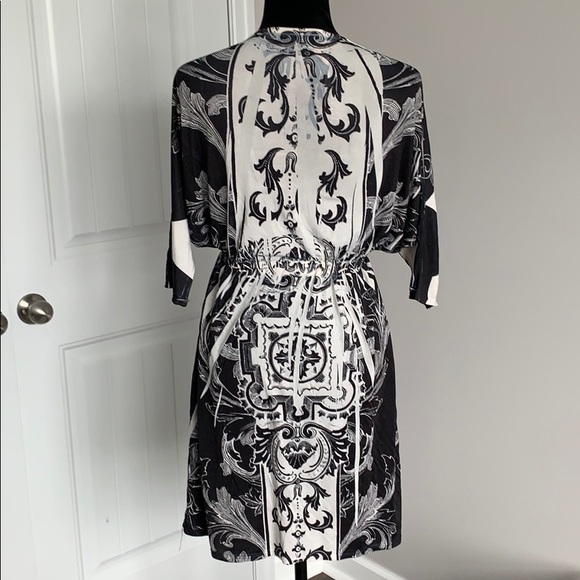 Cute Dress with Rhinestone accent in the front - Picture 6 of 8